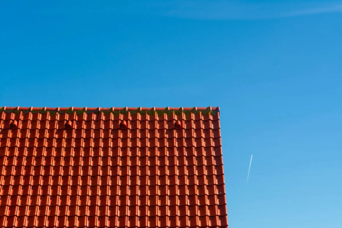 Tile roof gable in full sun, the kind of exposure that sets roof life in Levelland, TX